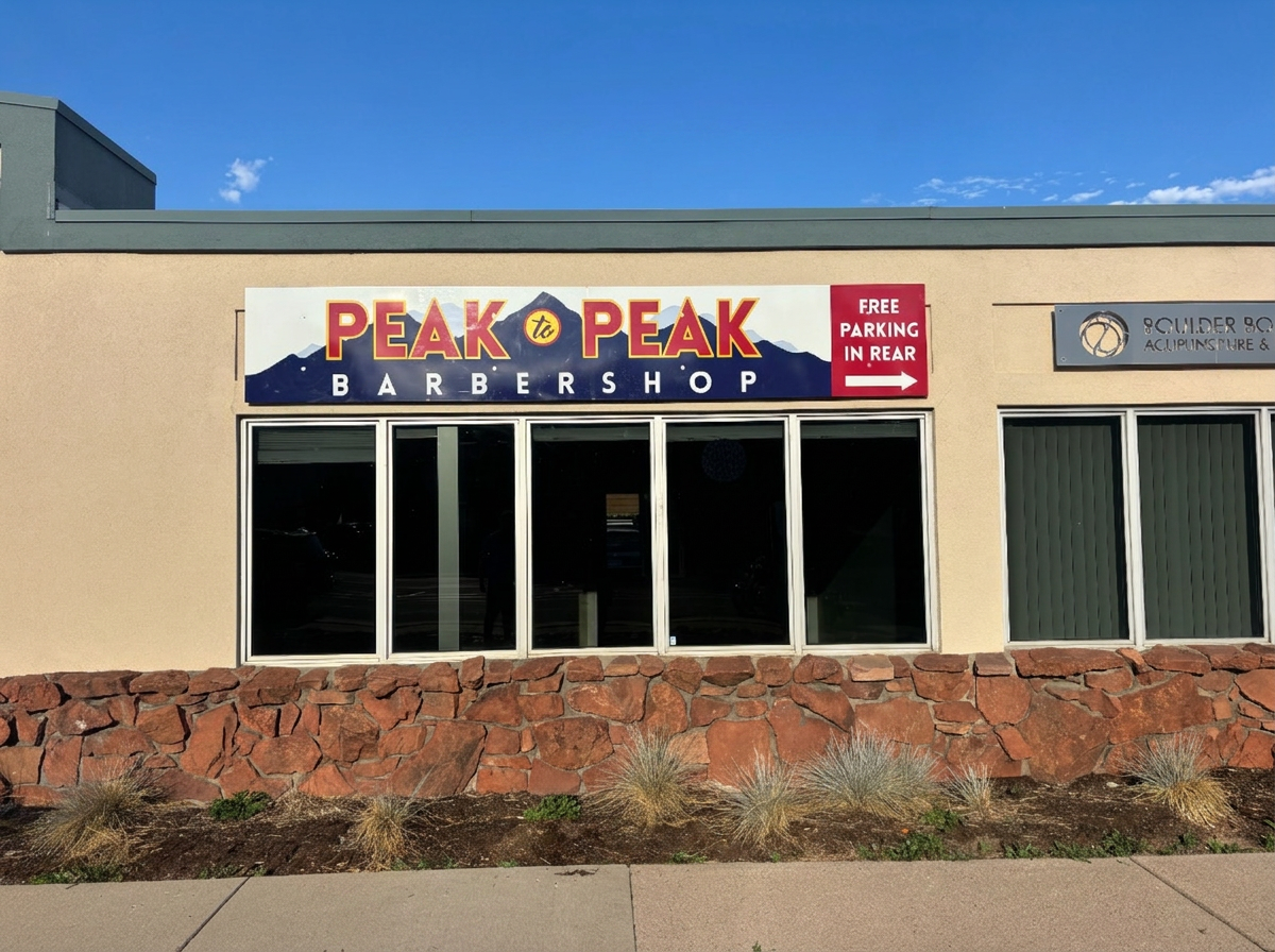 Exterior storefront of Peak to Peak Barbershop on Folsom Street in Boulder, Colorado